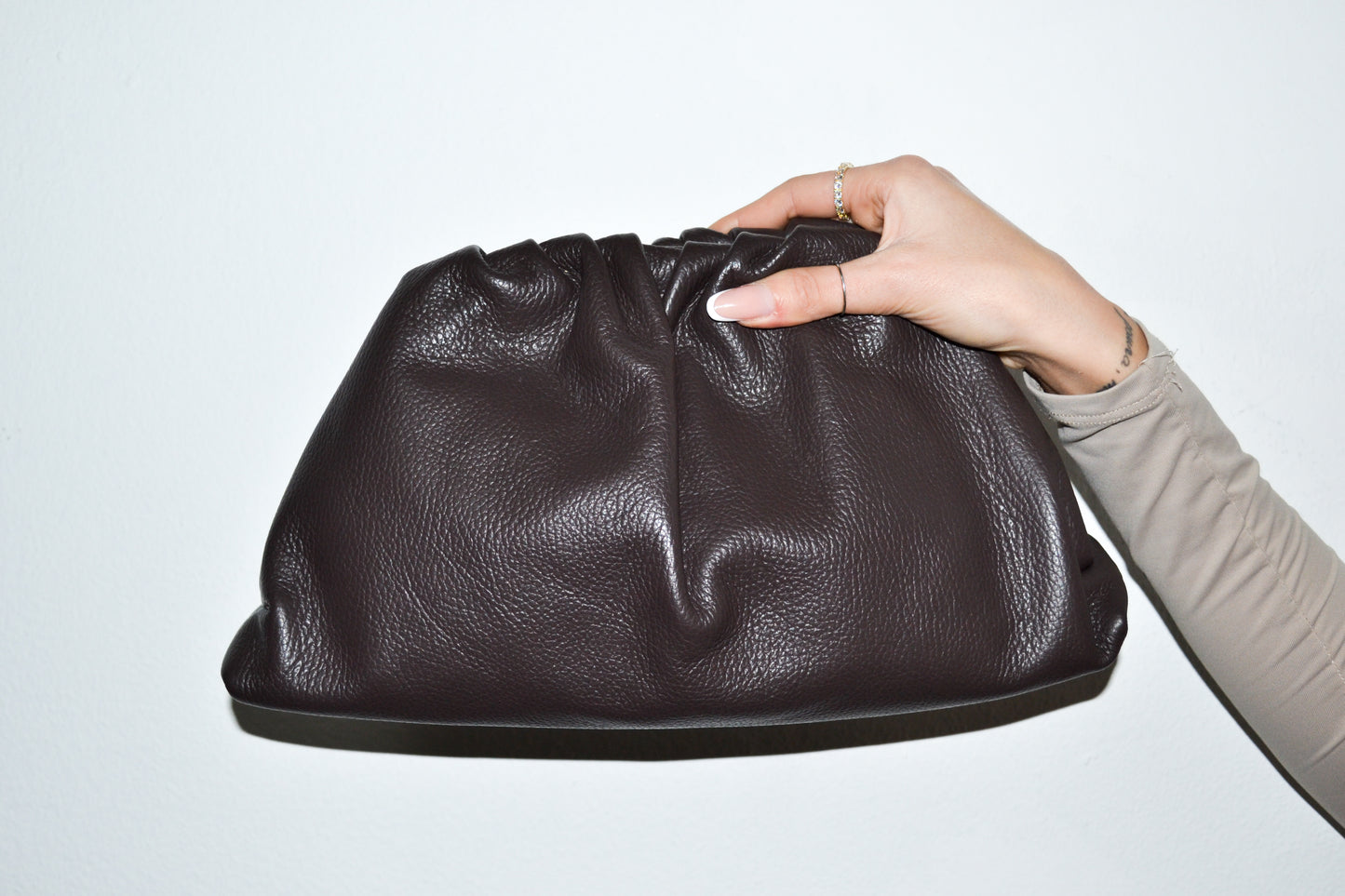 Clutch marrone in vera pelle